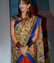 manchu-lakshmi-saree-stills-at-potugadu-audio-launch-2