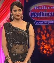 Anasuya-Hot-Navel-Show-In-Black-Saree-photos-Jabardasth-Episode-3