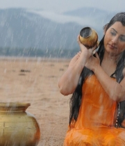 archana-took-bath-in-rain-photos-11