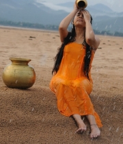 archana-took-bath-in-rain-photos-12