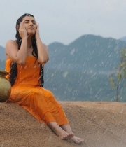 archana-took-bath-in-rain-photos-13