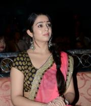 charmi-saree-stills-at-potugadu-audio-launch-13