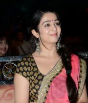 charmi-saree-stills-at-potugadu-audio-launch-14