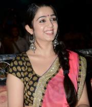 charmi-saree-stills-at-potugadu-audio-launch-15