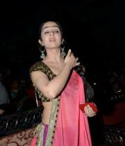 charmi-saree-stills-at-potugadu-audio-launch-22