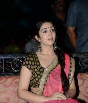charmi-saree-stills-at-potugadu-audio-launch-25