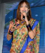 manchu-lakshmi-saree-stills-at-potugadu-audio-launch-11