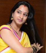 surekha-vani-saree-stills-at-yevadu-press-meet-21