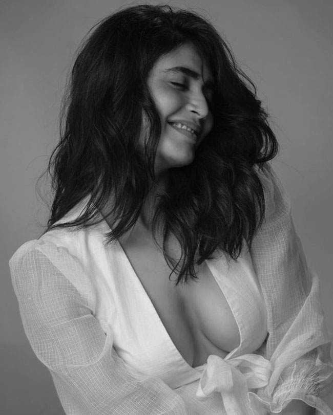 Karishma Tanna Stunning Pose In White Dress