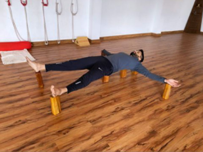 Naga Chaitanya Balances His Body On A Few Wood Pieces