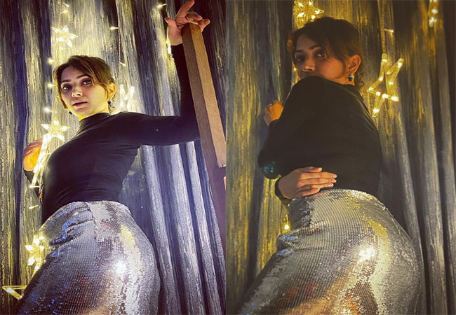 అమ్మడి గ్లామరస్ గ్రీటింగ్ షో అదిరిందిగా..!!